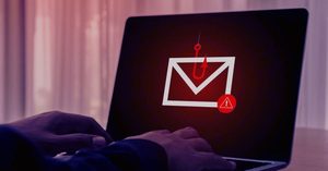 Man Emailing On Computer